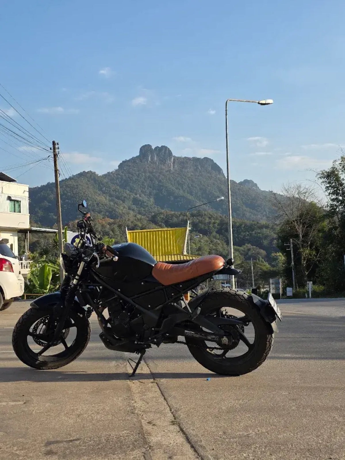 Fleet CNX Honda CB300 parked by a mountain road near Chiang Mai