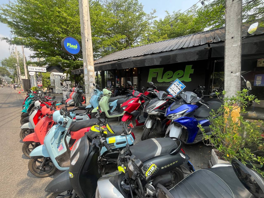 Fleet CNX shop on Nimmanhaemin Soi 17, Chiang Mai, with rental scooters outside